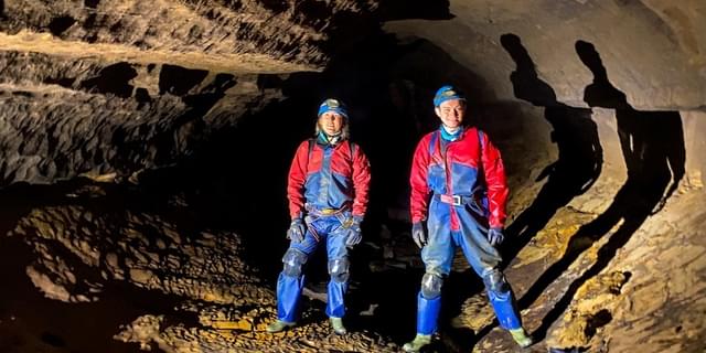 Cavers Exploring Derbyshire Cave