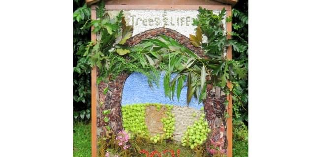 Spital Cemetary well dressing 2024 for 25 Glynn Williams