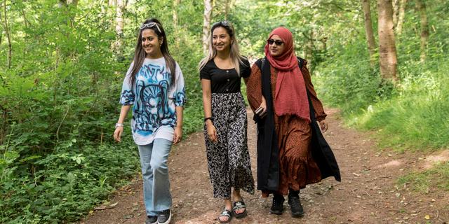 Visitors walking in the woodland at Foremark Derbyshire